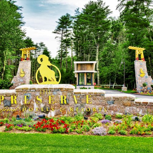 An entrance to a resort named 