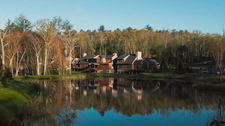 Single-family homes at The Preserve Sporting Club with serene lakeside views and natural surroundings.