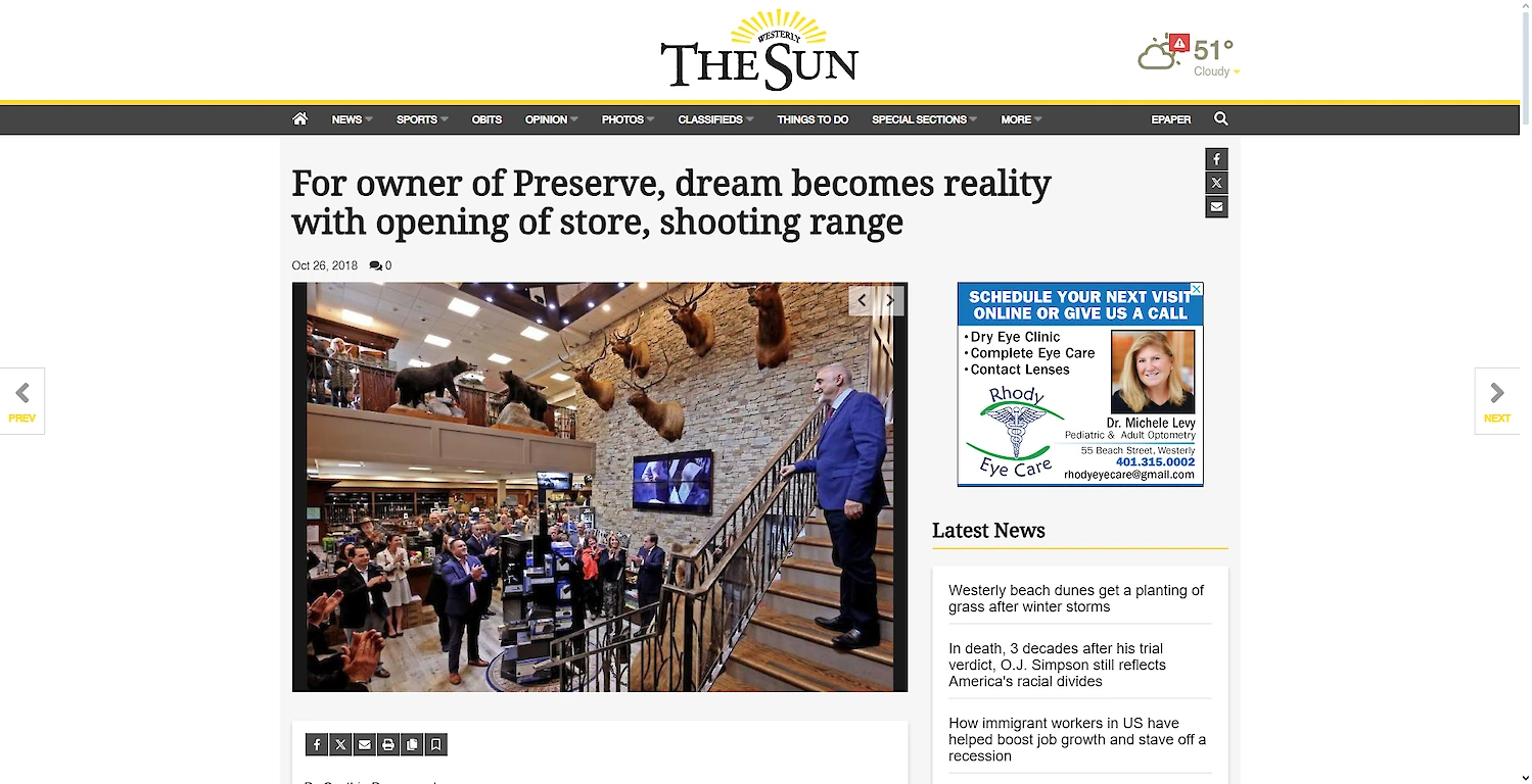 A screenshot of a news article from The Sun about the opening of a store and shooting range by the owner of Preserve, featuring an image of the event.