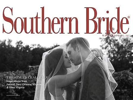 A couple kissing under a veil on the cover of Southern Bride magazine, featuring wedding themes and honeymoon tips.